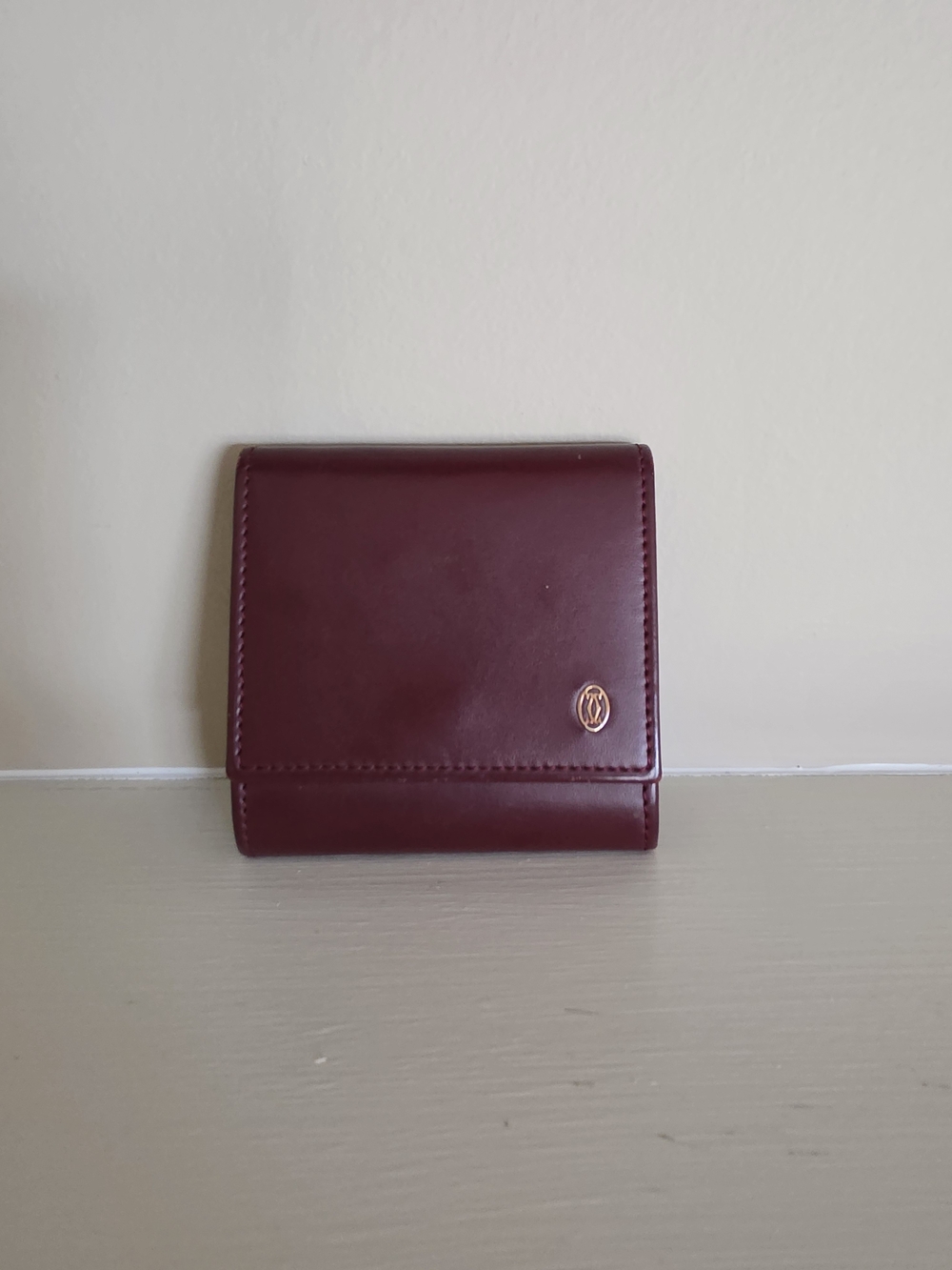 Cartier Burgundy Leather Compact Wallet with Gold Logo